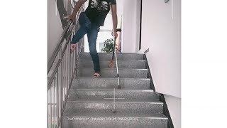 strong woman with polio short leg using her crutches on the stairs