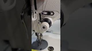 How to thread the bobbin and machine on the Juki DU 1181N Industrial sewing machine.